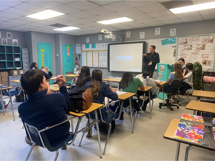 Fr. Cambre with 8th Graders